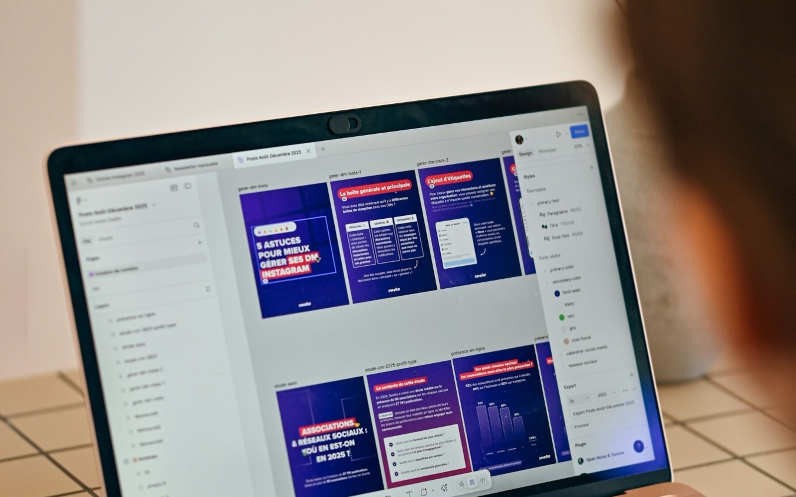 Person reviewing website presentation slides on a laptop