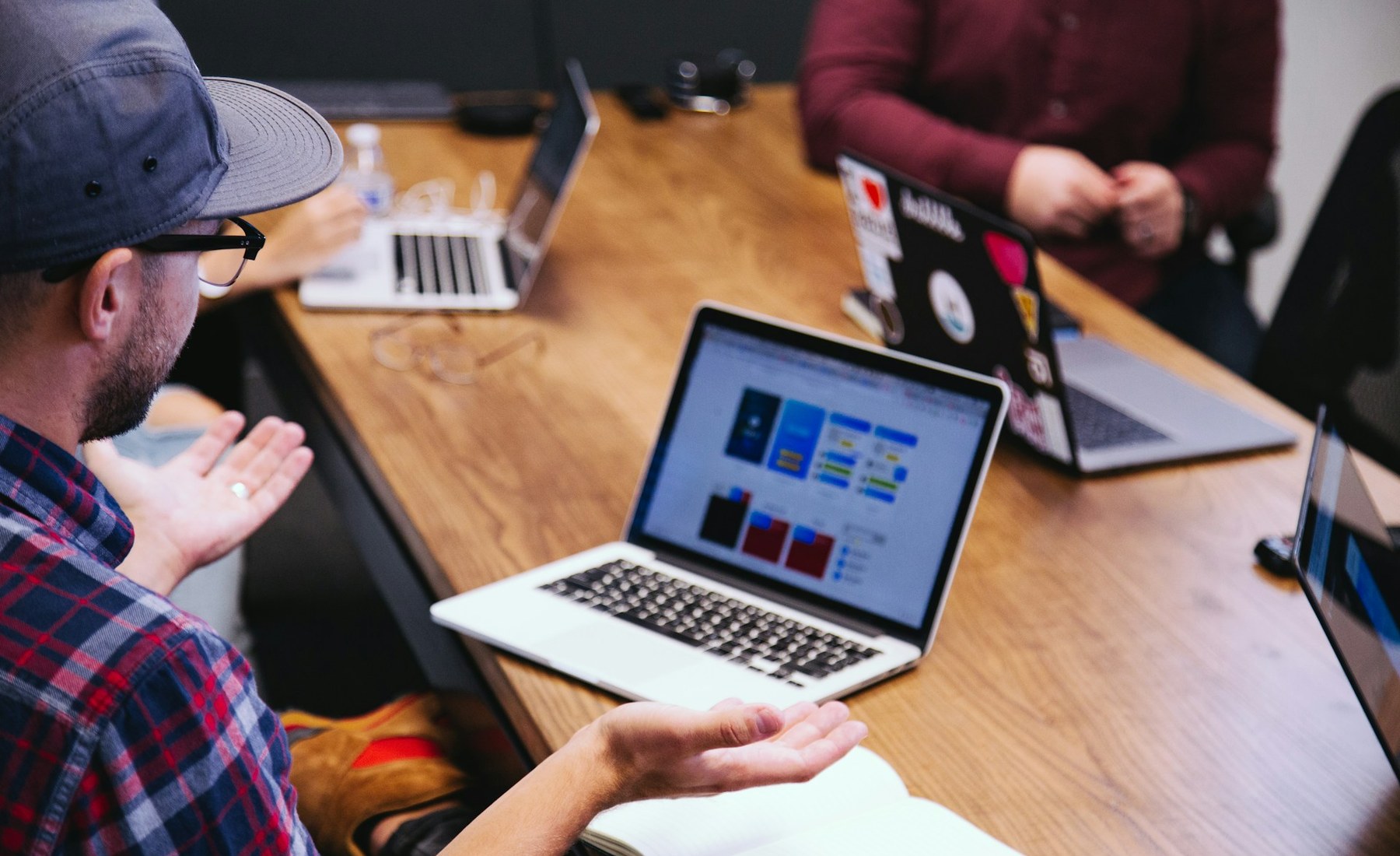 People discussing ideas during a website planning meeting